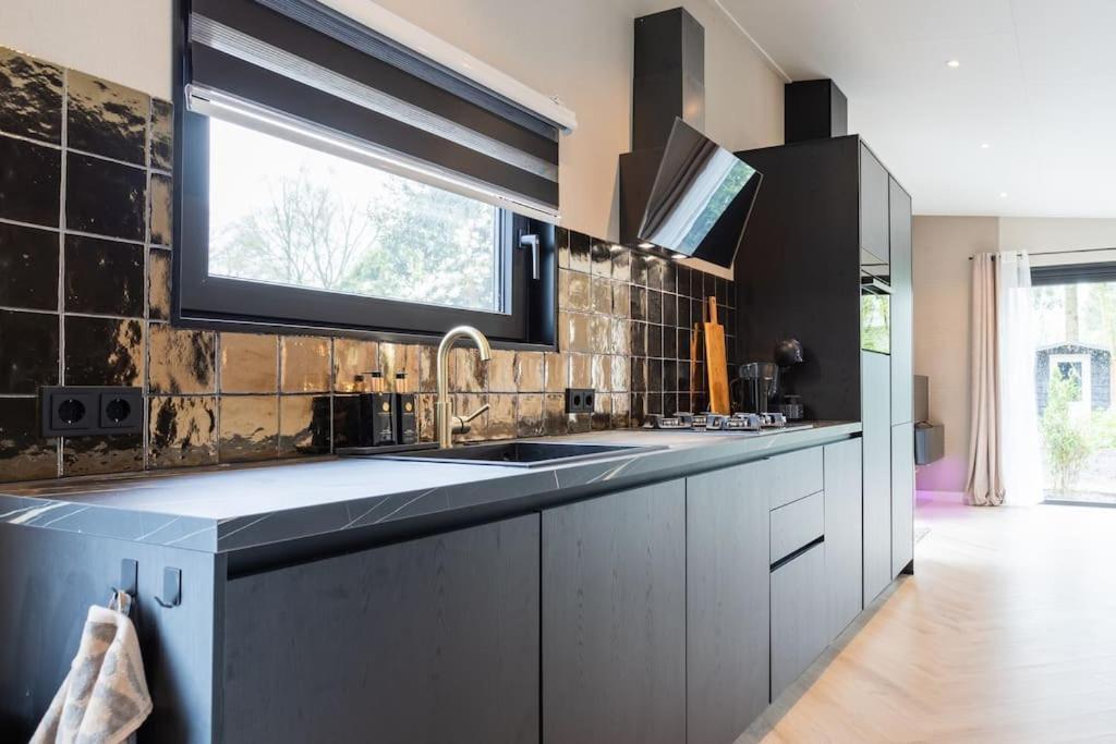 Veluwe Boutique Lodge Пюттен Экстерьер фото